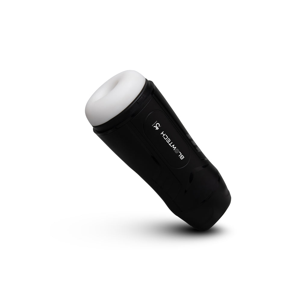 Black automatic vibrating masturbator with soft white internal sleeve and ergonomic grip, designed for powerful hands-free solo pleasure