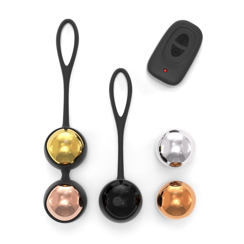 Set of interchangeable Kegel exercise balls in black silicone holders with remote control, featuring gold, rose gold, silver, and copper weights for progressive pelvic floor training
